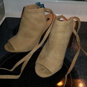 Peep toe ankle tie booties